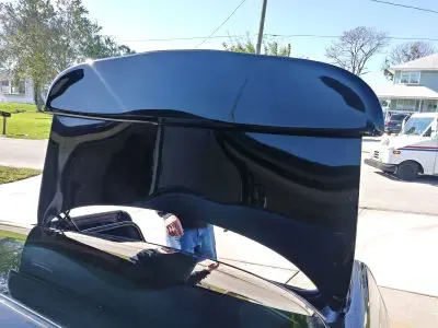 The same spoiler deep black and glossy after detailing
