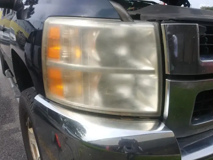 Cloudy, oxidized truck headlight before restoration
