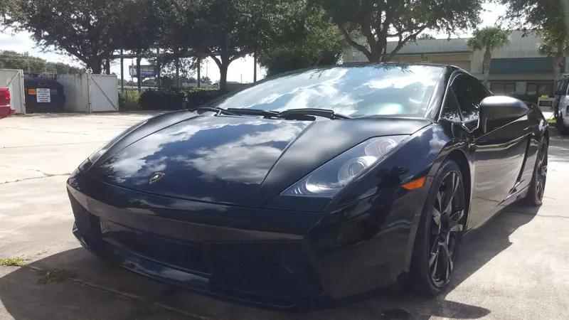 Dark blue Lamborghini Gallardo after a mobile wash