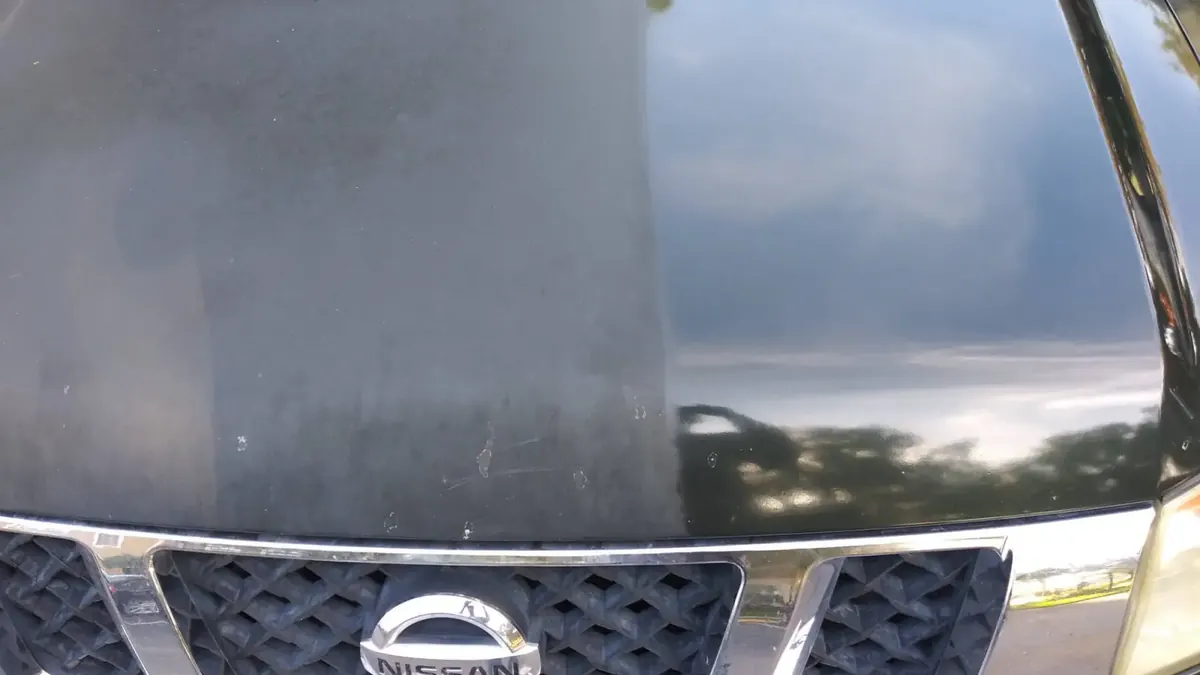 Hood mid-way through paint correction