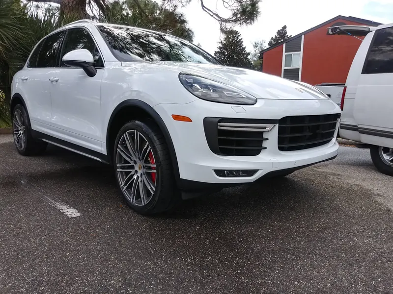 White Porsche Cayenne after a wash and wax