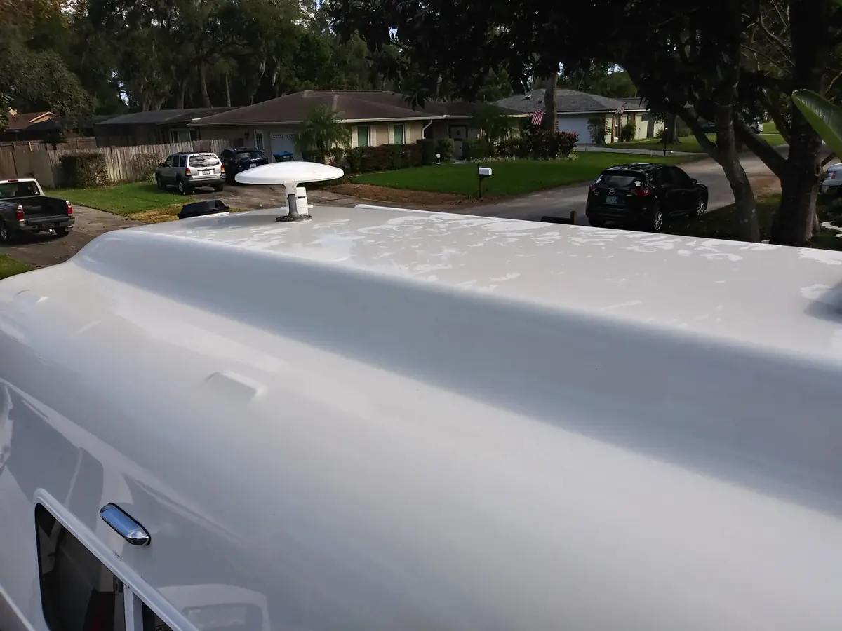 Clean white RV roof after washing