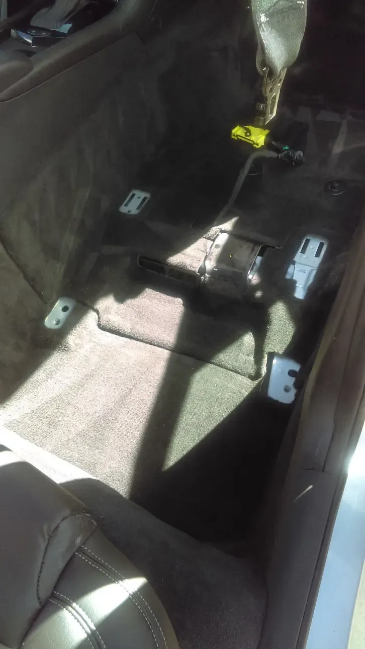 Stripped car floor during flood-water extraction